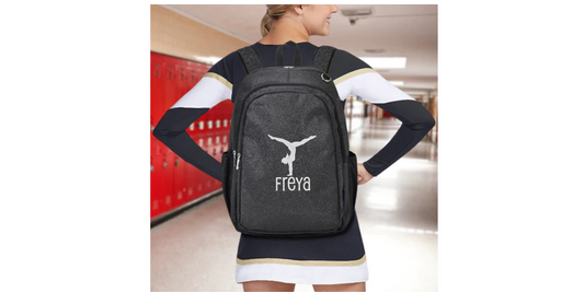 Designed for comfort, the adjustable shoulder strap allows for a personalized fit, making this backpack ideal for practice, competitions, or everyday adventures. Experience the perfect combination of style and practicality with this spacious backpack, measuring 12" L x 7.5" W x 18¼" H.