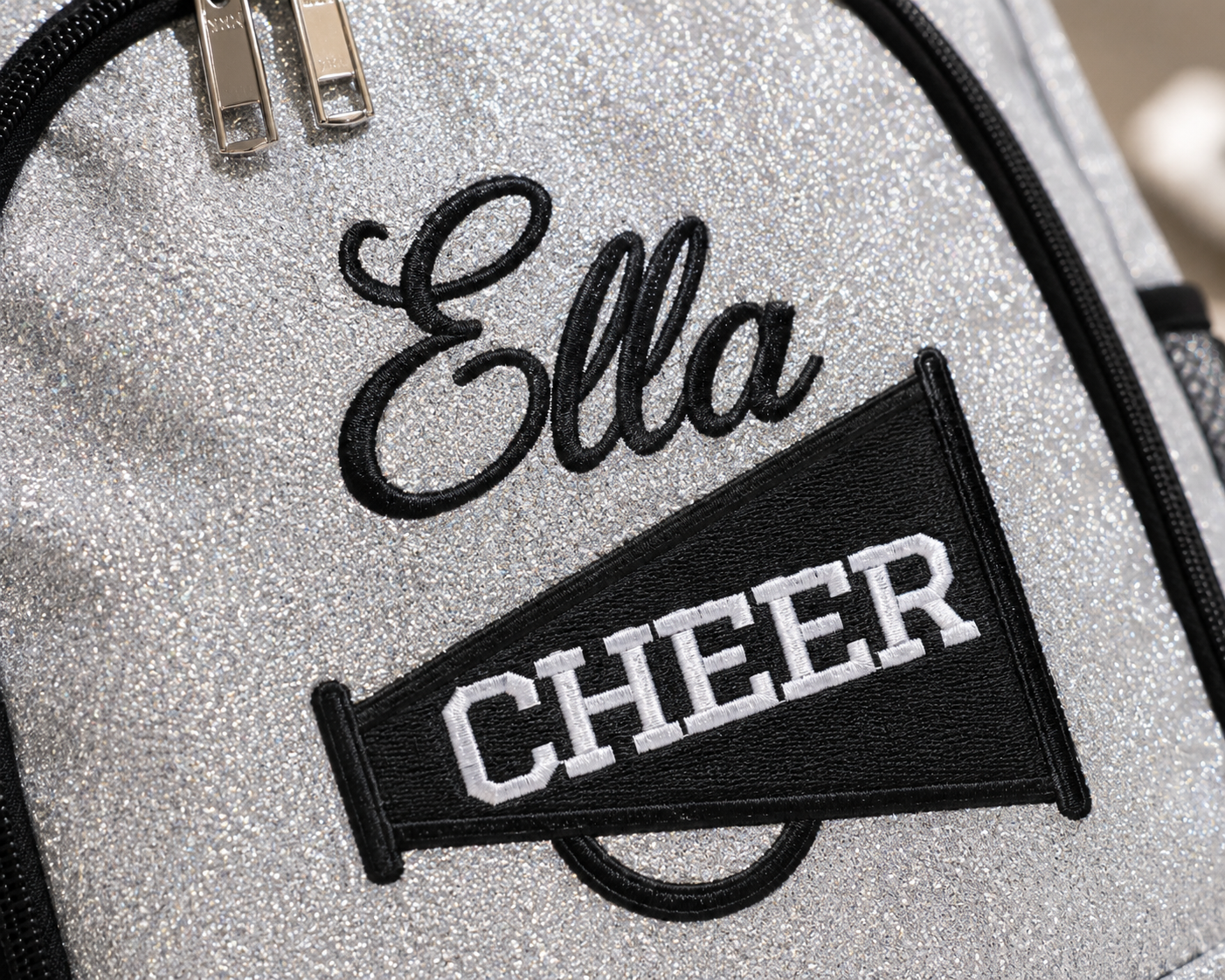 close up embroidery personalized cheer backpack