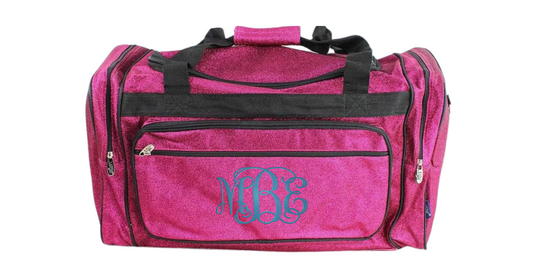Dimensions:

Width: 23" (excluding side pockets)
Bottom Width: 18"
Height: 11"
Depth: 9"