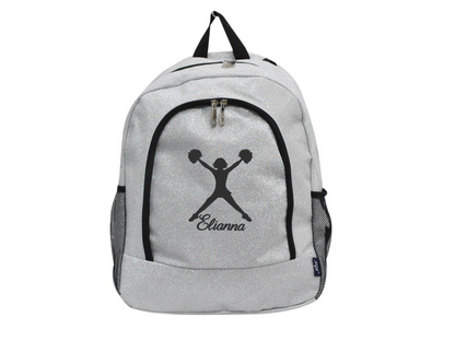 Silver glitter cheer backpack with black cheerleader silhouette and custom name “Elianna” on the front pocket